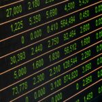 Detailed view of a stock market screen showing numbers and data, symbolizing financial trading.